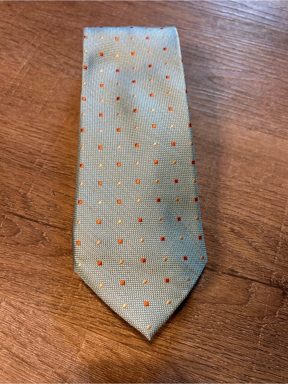 Light Blue Polka Dot Men's Tie with Orange Accents